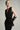 Black shimmer jersey maxi dress with a draped cowl neckline and delicate embellishments - IHF STUDIO