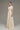Ivory crochet lace A-line gown with short sleeves and crystal detailing at neckline and waist - IHF STUDIO