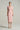 Light pink crepe bodycon midi dress with deep V-neckline and crystal embellishment - IHF STUDIO