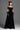 Black Velvet Maxi Dress With Ruffle Details And Heart-Shaped Embellishment