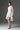 White Floral Vine Lace Mini Mullet Dress With Halter Neck And Long Sleeves