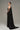 Black crystal-embellished corset maxi dress with sculpted bodice and detachable train - IHF STUDIO
