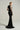 Black shimmer jersey maxi dress with a draped cowl neckline and delicate embellishments - IHF STUDIO