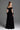Black Velvet Maxi Dress With Ruffle Details And Heart-Shaped Embellishment - IHF STUDIO
