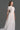 White Architectural Lace Bustier A-Line Dress With Mini Cape And Crystal Embellishment - IHF STUDIO