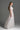 White Architectural Lace Bustier A-Line Dress With Mini Cape And Crystal Embellishment - IHF STUDIO